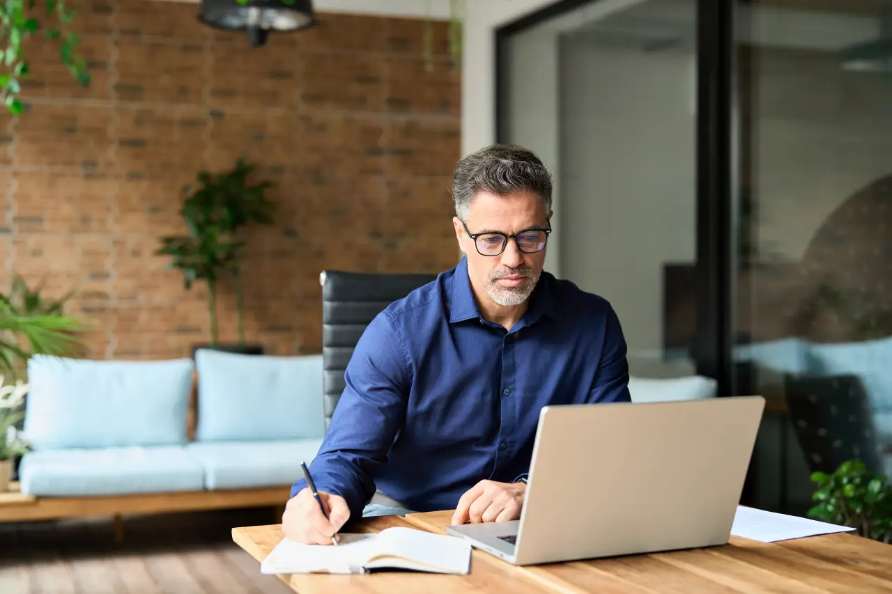 Business owner working on his laptop